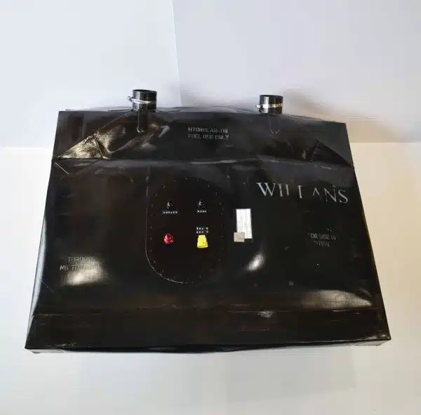 A black Willans control box with buttons and switches on a white background.