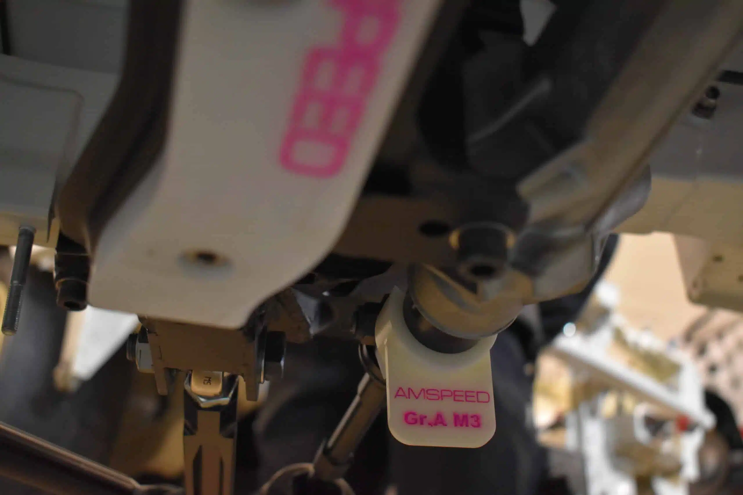 Close-up view of the foot pedals on a sewing machine.