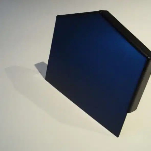 A blue metal bracket with a black edge on a white surface.
