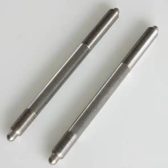 Two metal double-ended threaded studs on a white background.