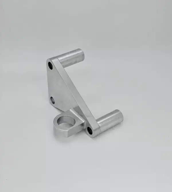 Silver metal bracket with three arms and circular holes, placed on a plain white background.