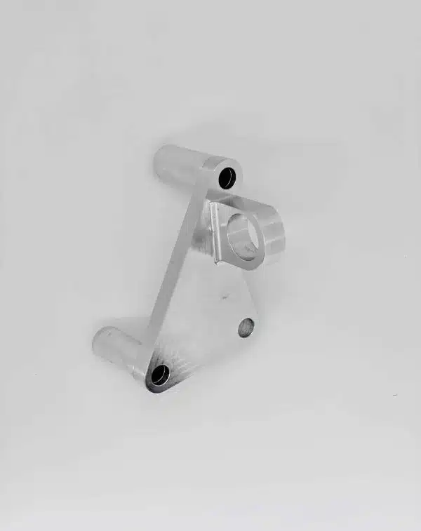 Silver metal bracket with three cylindrical ends on a white background.