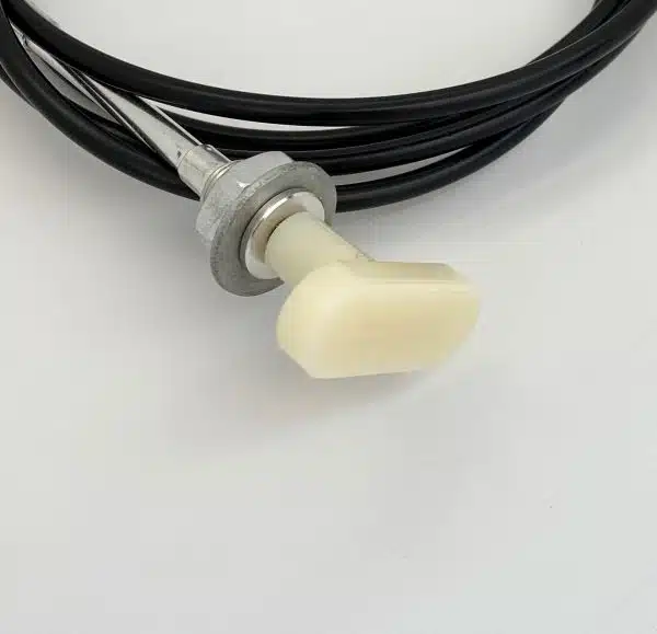 White plastic knob attached to a metal shaft, with black cable coiled around it on a white background.