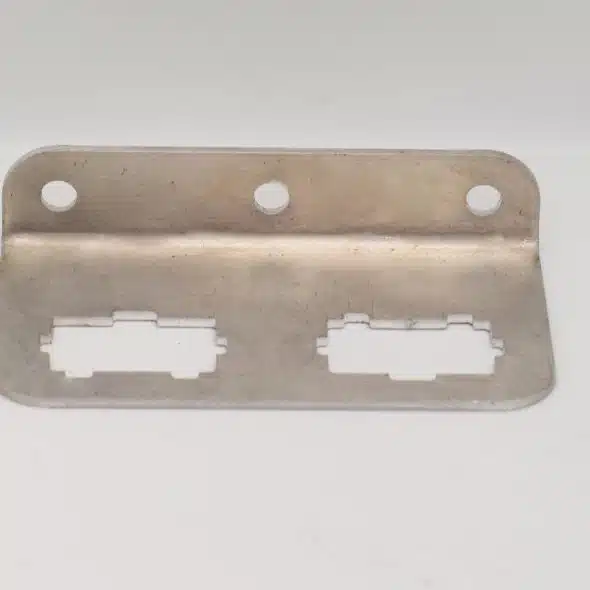 A metal sensor bracket with three round holes and two rectangular cutouts on a white background.